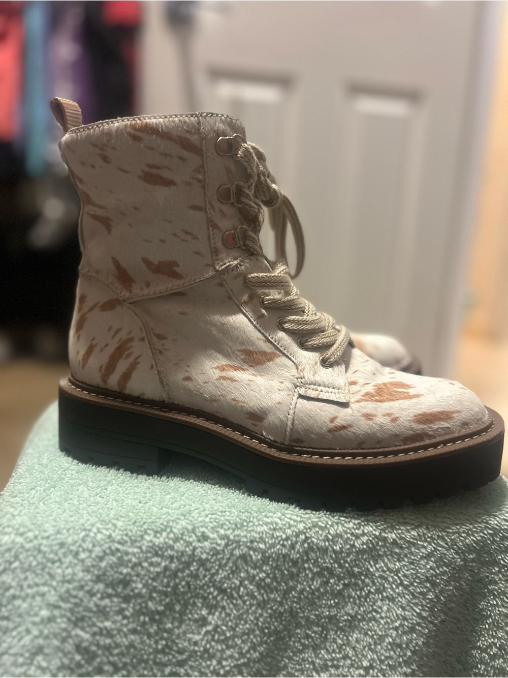 Sam Edelman Lue 2 Combat Boot in a natural and ivory cow-print calf hair 7.5